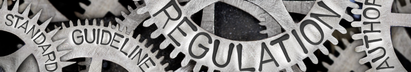 Gears with words engraven into them like standard, guidelines, regulation, and authority