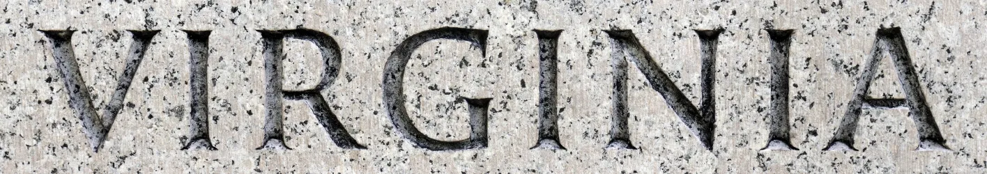 The word Virginia engraved in stone