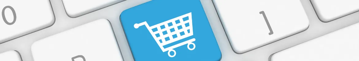 Keyboard with blue button with a white shopping cart on it