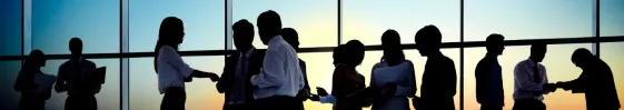 People at work around a conference table